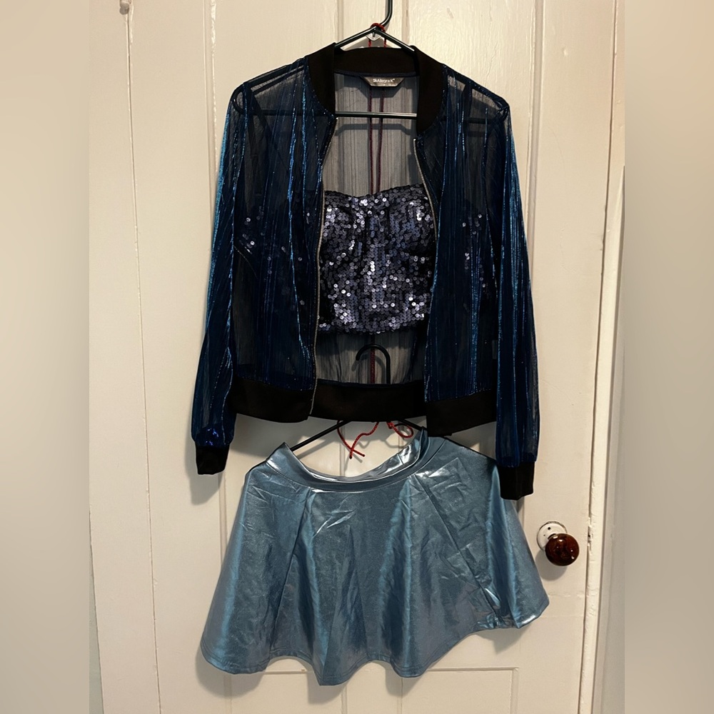 Eras tour outfit. 1989. Blue metallic skirt. Sequin bra top. Holographic jacket.